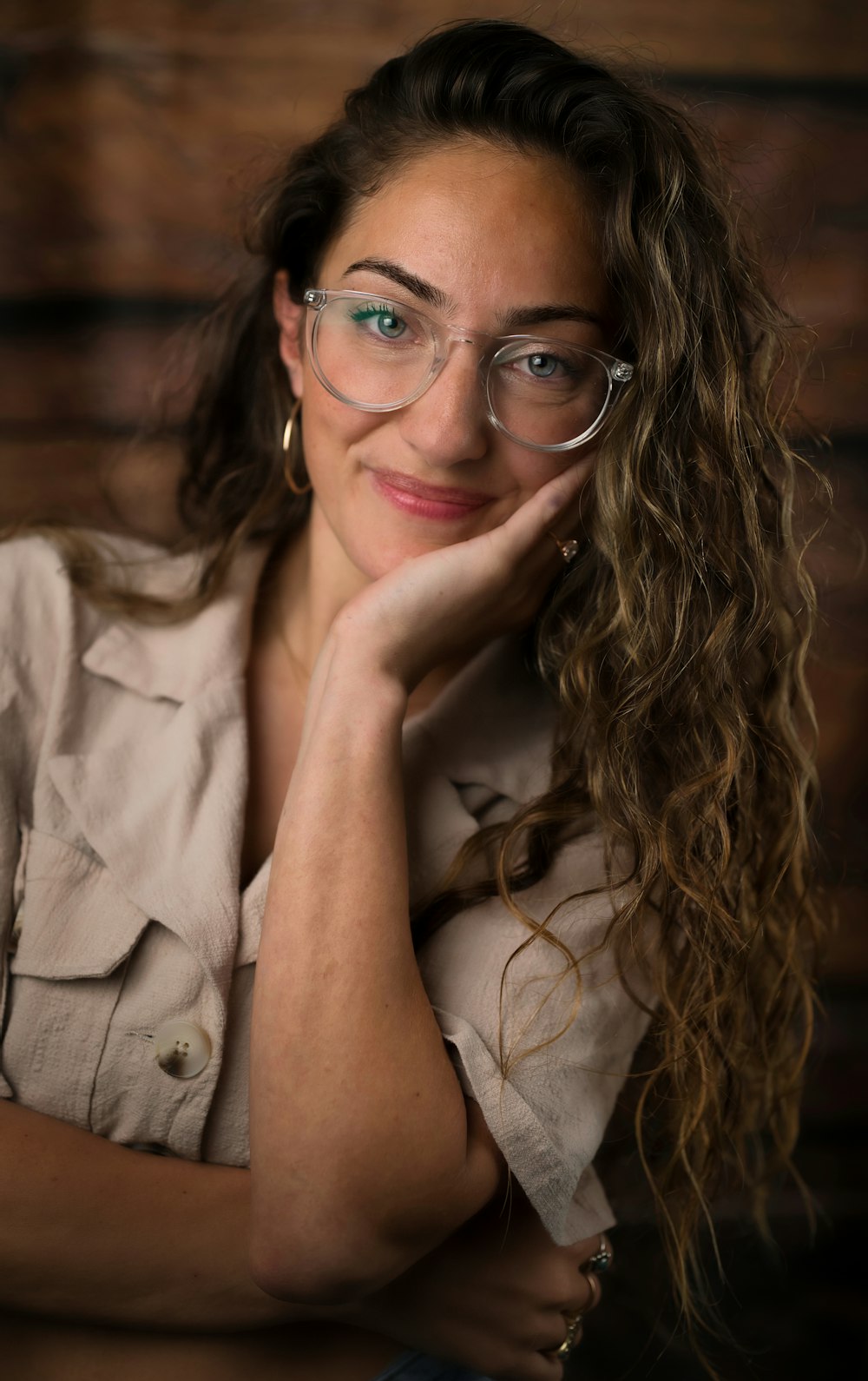 woman in white button up shirt wearing eyeglasses