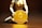 A figurine kneels and holds a large gold coin featuring the Ethereum logo and text. The background is dark, highlighting the coin's metallic sheen.