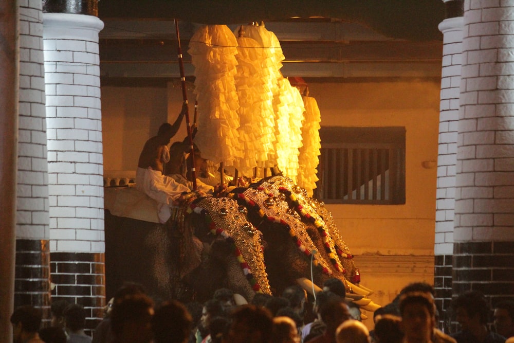 people gathering in front of fire