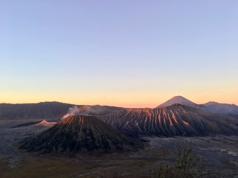brown mountain under white sky during daytime
