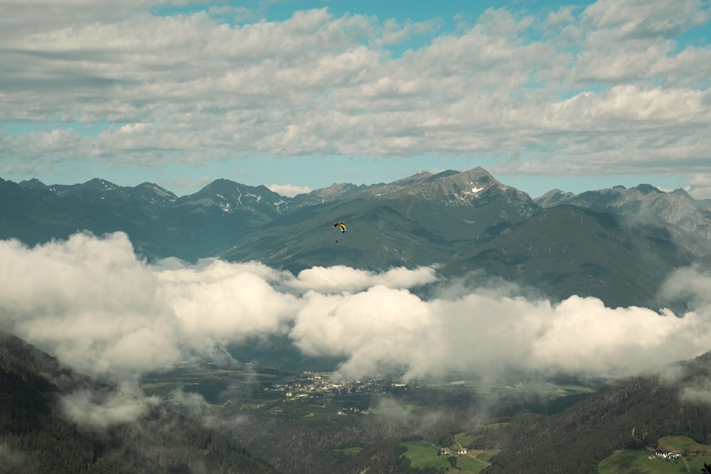 green mountains under white clouds during daytime