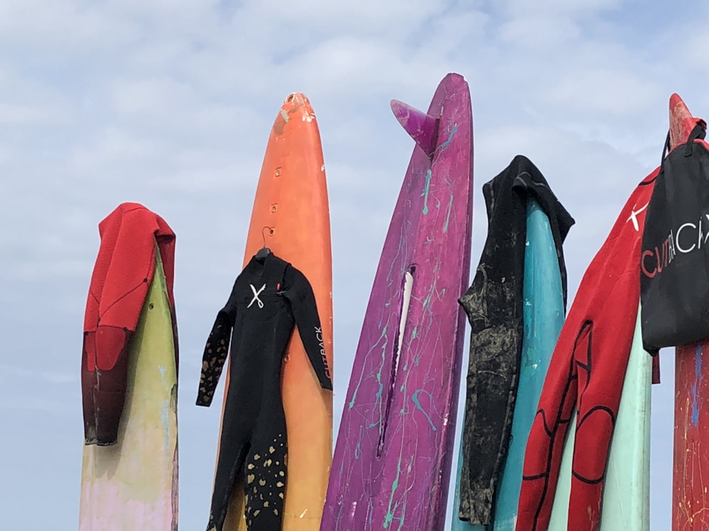 blue orange and yellow surfboard lot