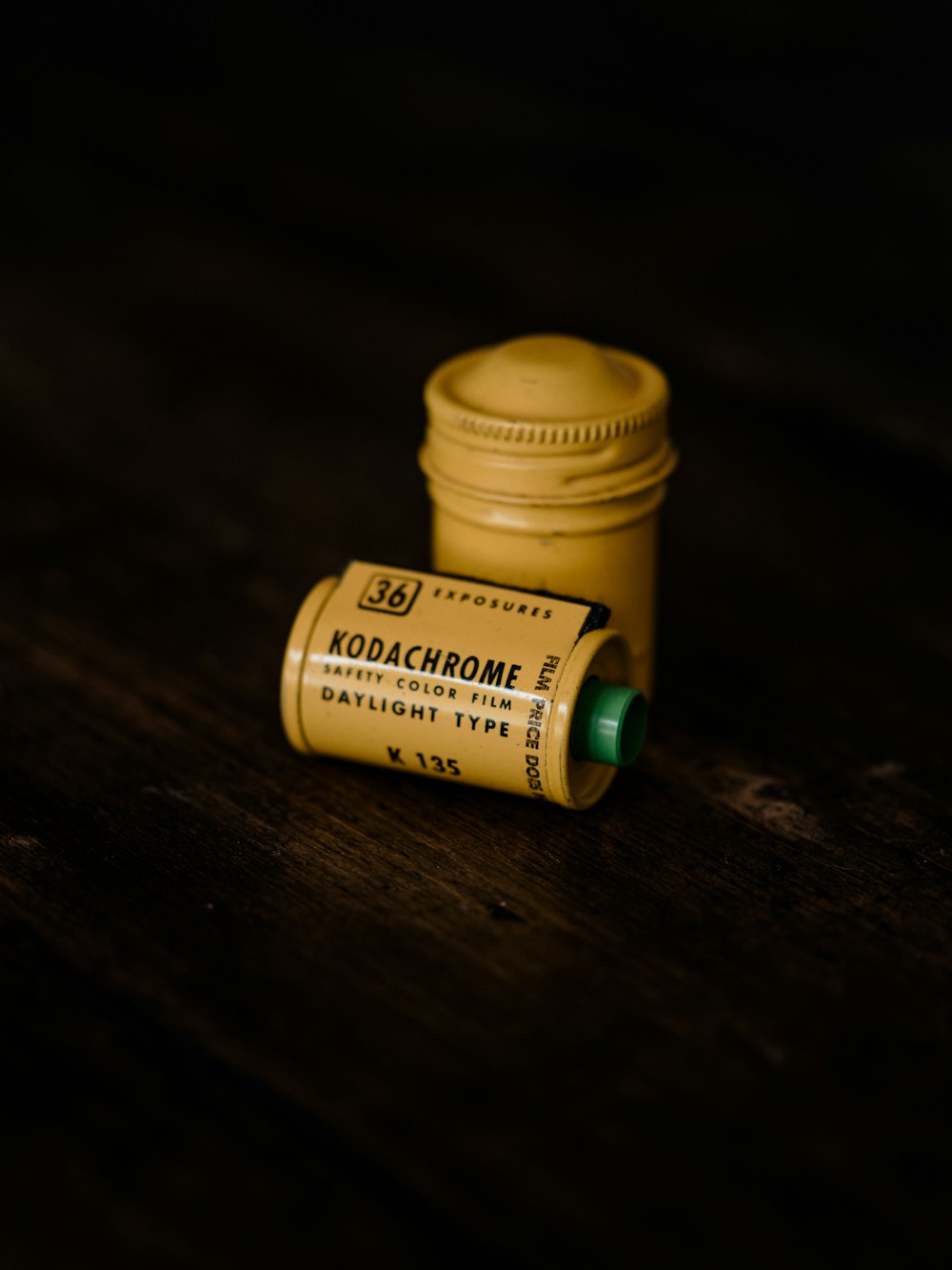 white plastic bottle on brown wooden table