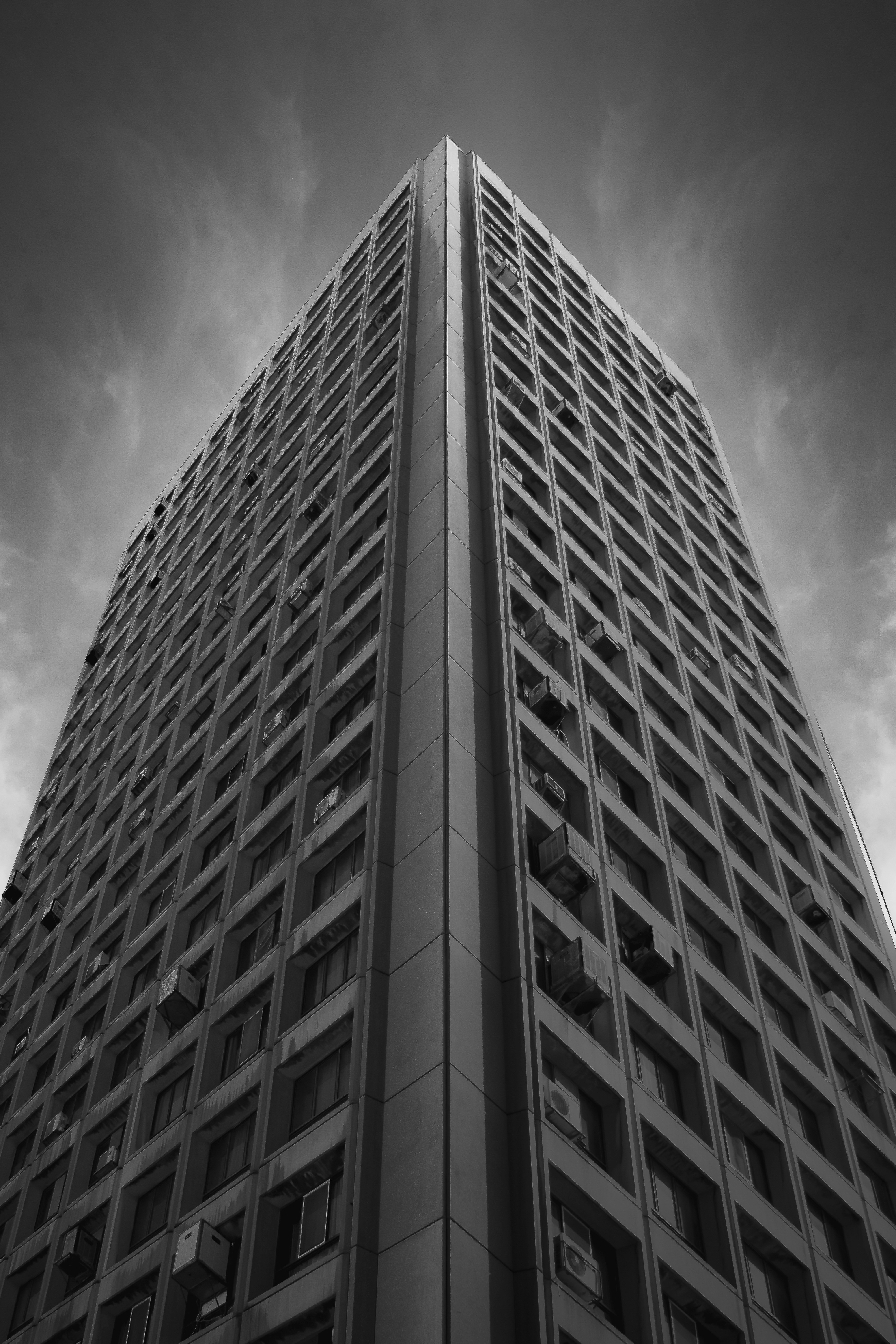 grayscale photo of high rise building