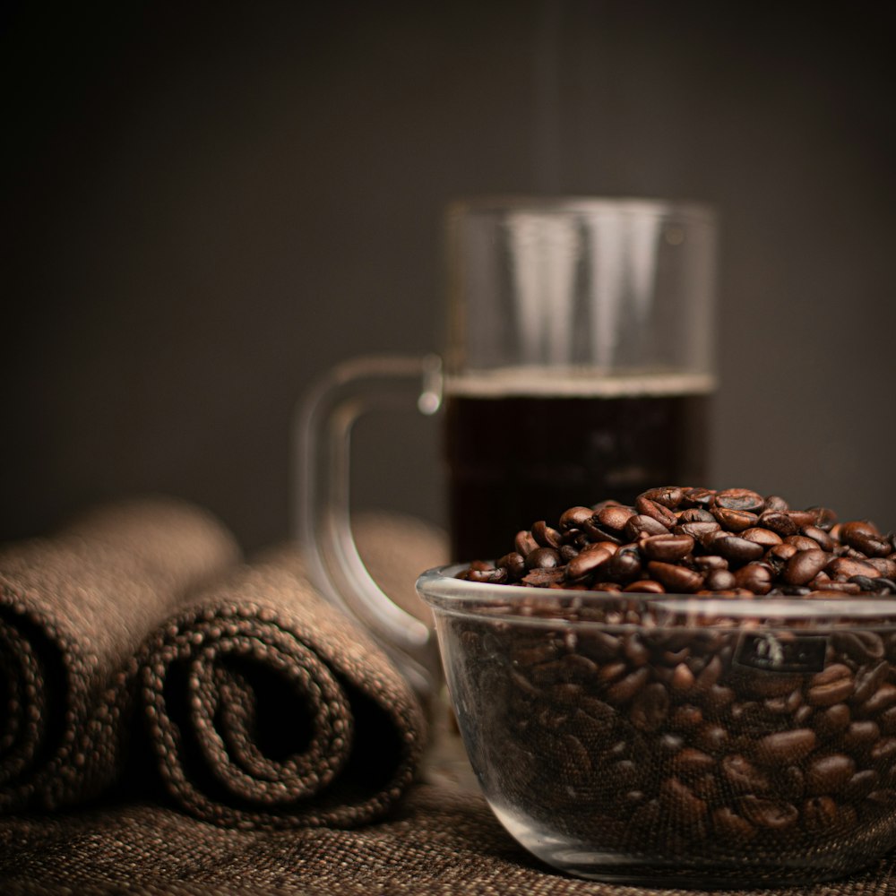 coffee beans in clear glass mug