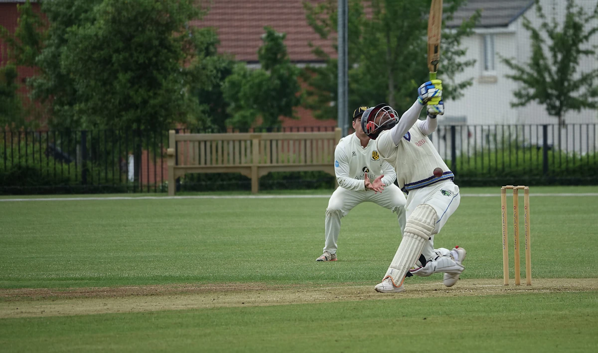Women's cricket players in action during a competitive match