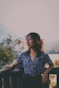 woman in blue and white floral button up shirt