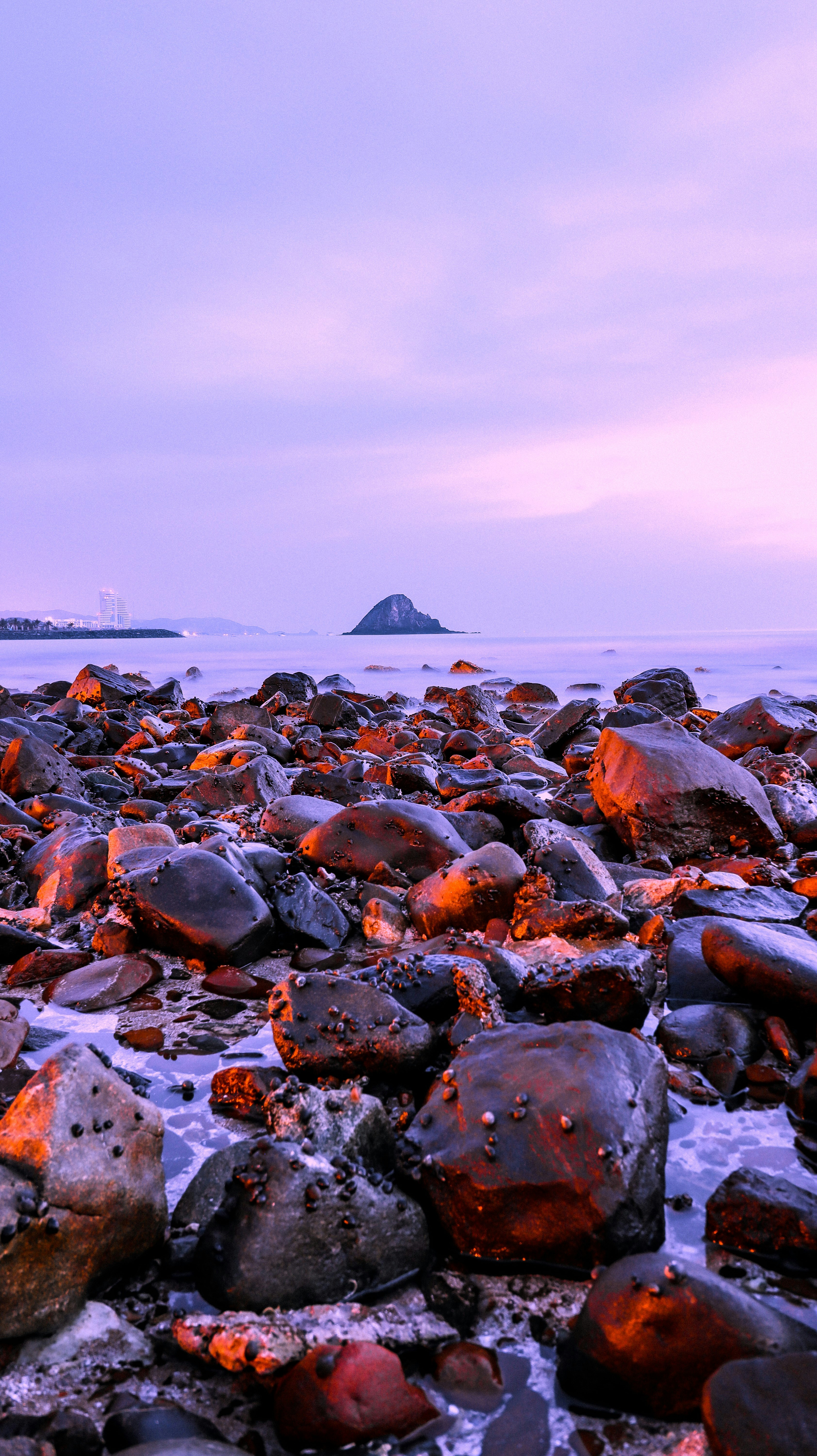 Black stones on beach during daytime photo – Free Rock Image on Unsplash