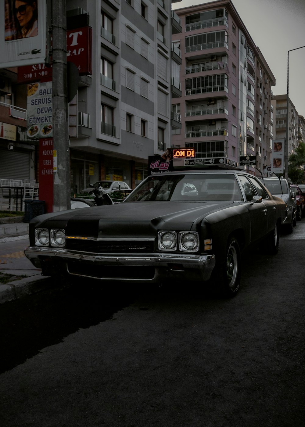 black coupe on road during daytime