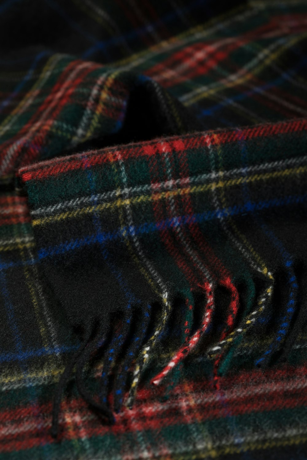 blue red and black plaid textile