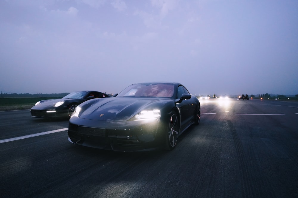 black porsche 911 on road during daytime