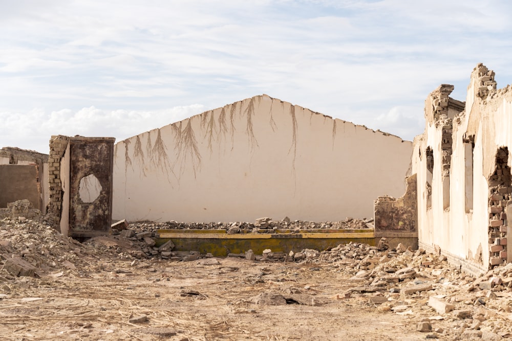 white concrete wall with graffiti during daytime