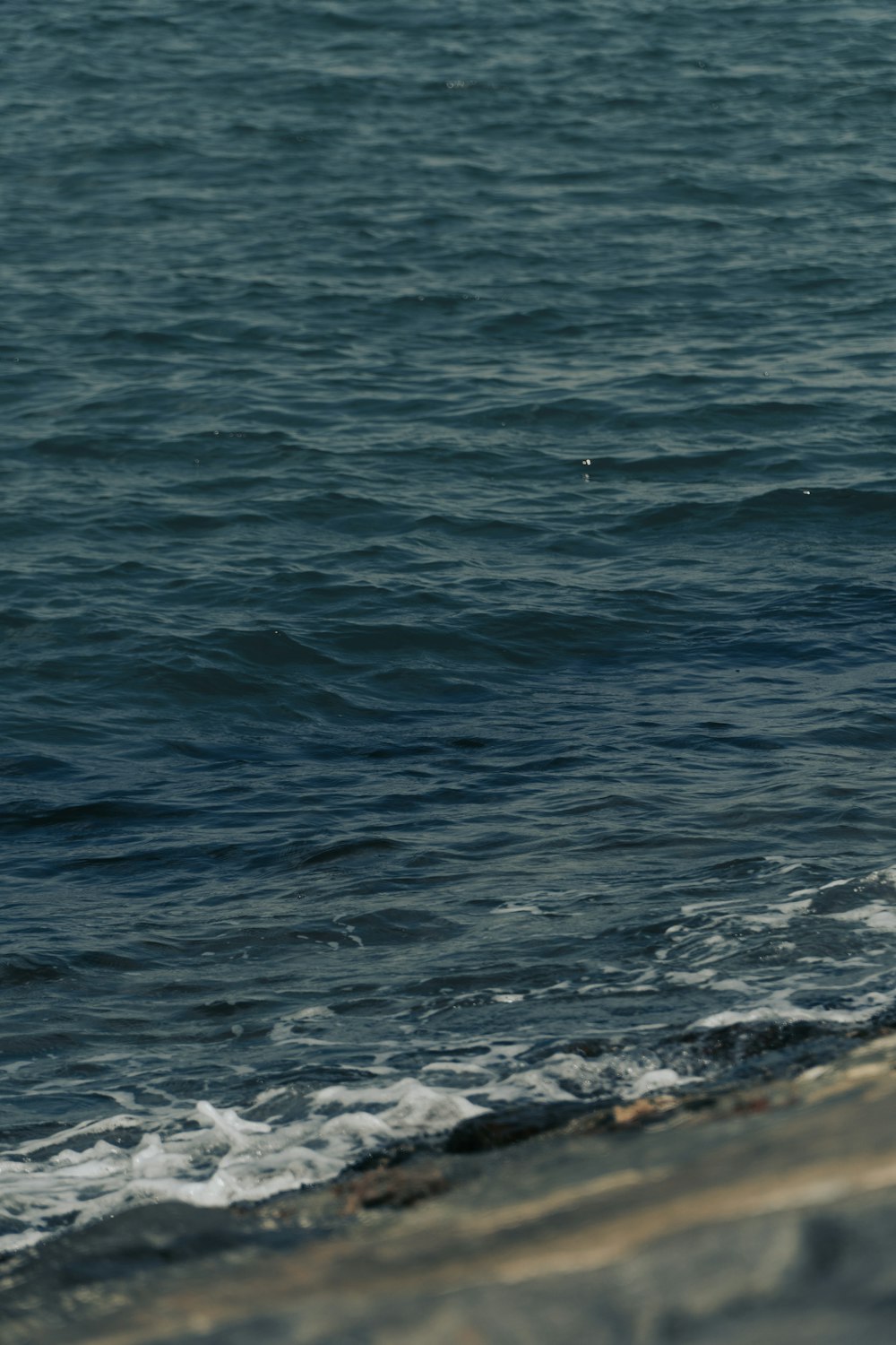 blue sea water during daytime