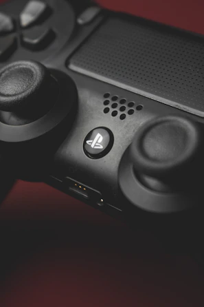 Close-up of a gaming controller with Tio Will Gamer's logo