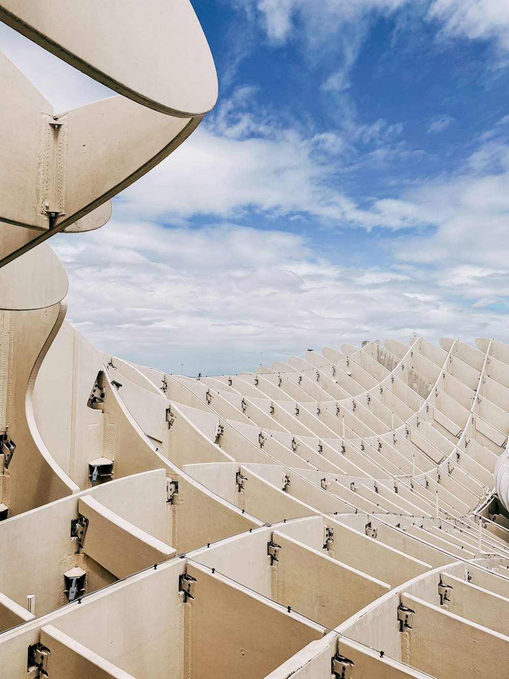 white concrete building under blue sky during daytime