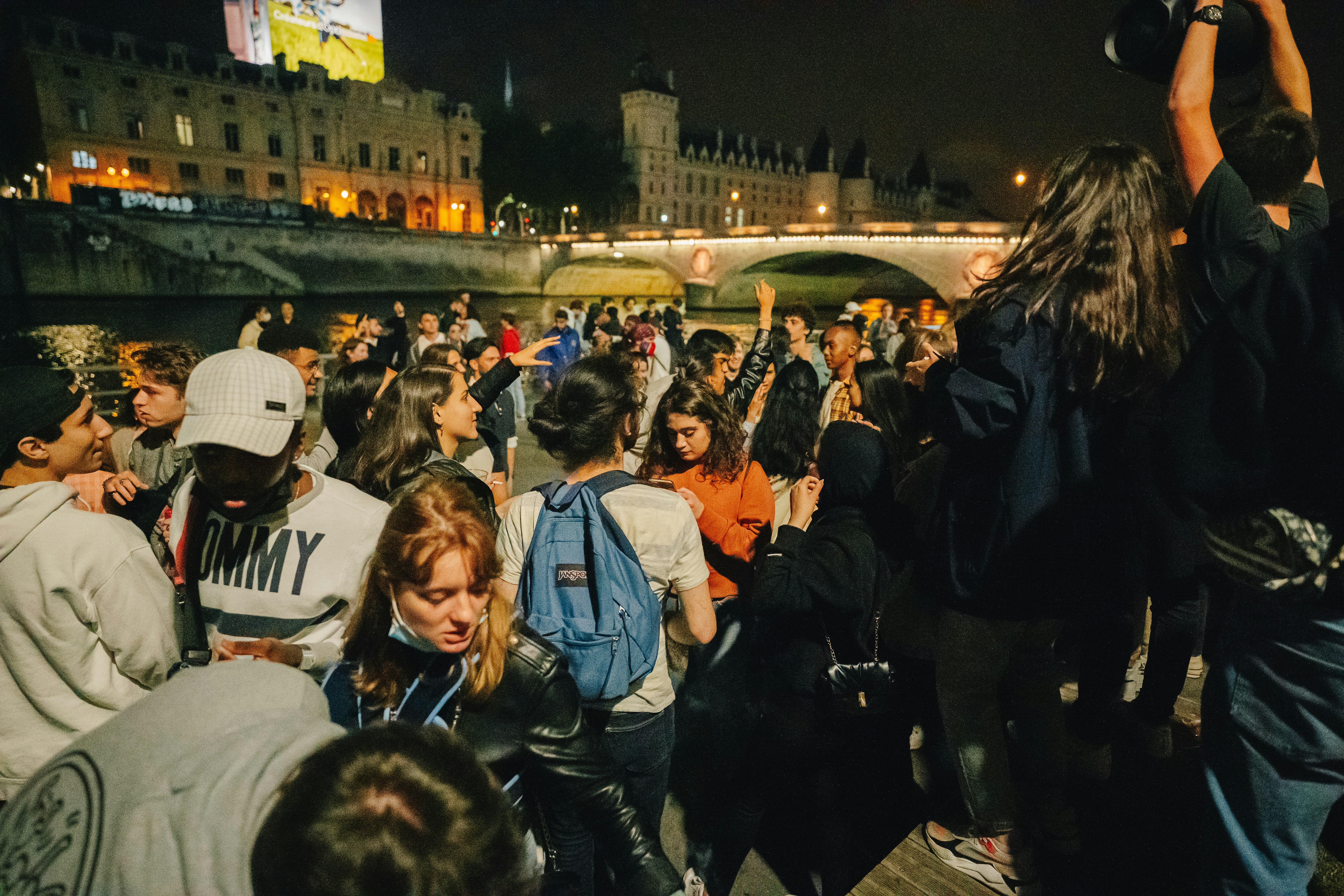 people standing on street during night time, free party in paris , ----------------- @real_jansen ----------------- don