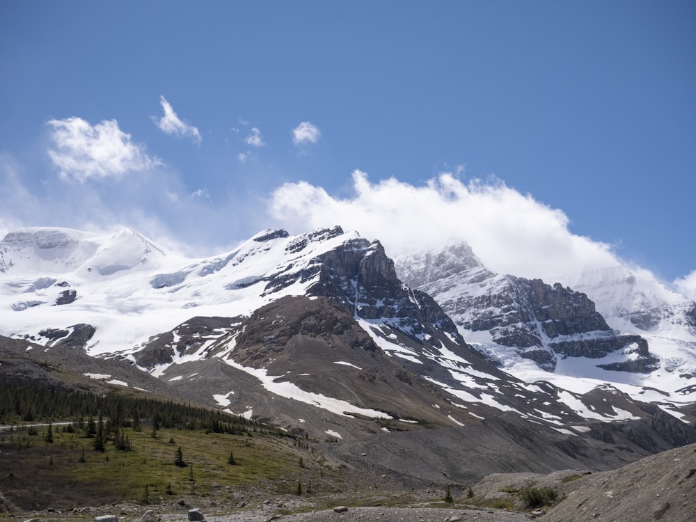 snow covered mountain under blue sky during daytime