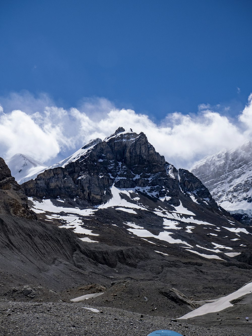 snow covered mountain under blue sky during daytime