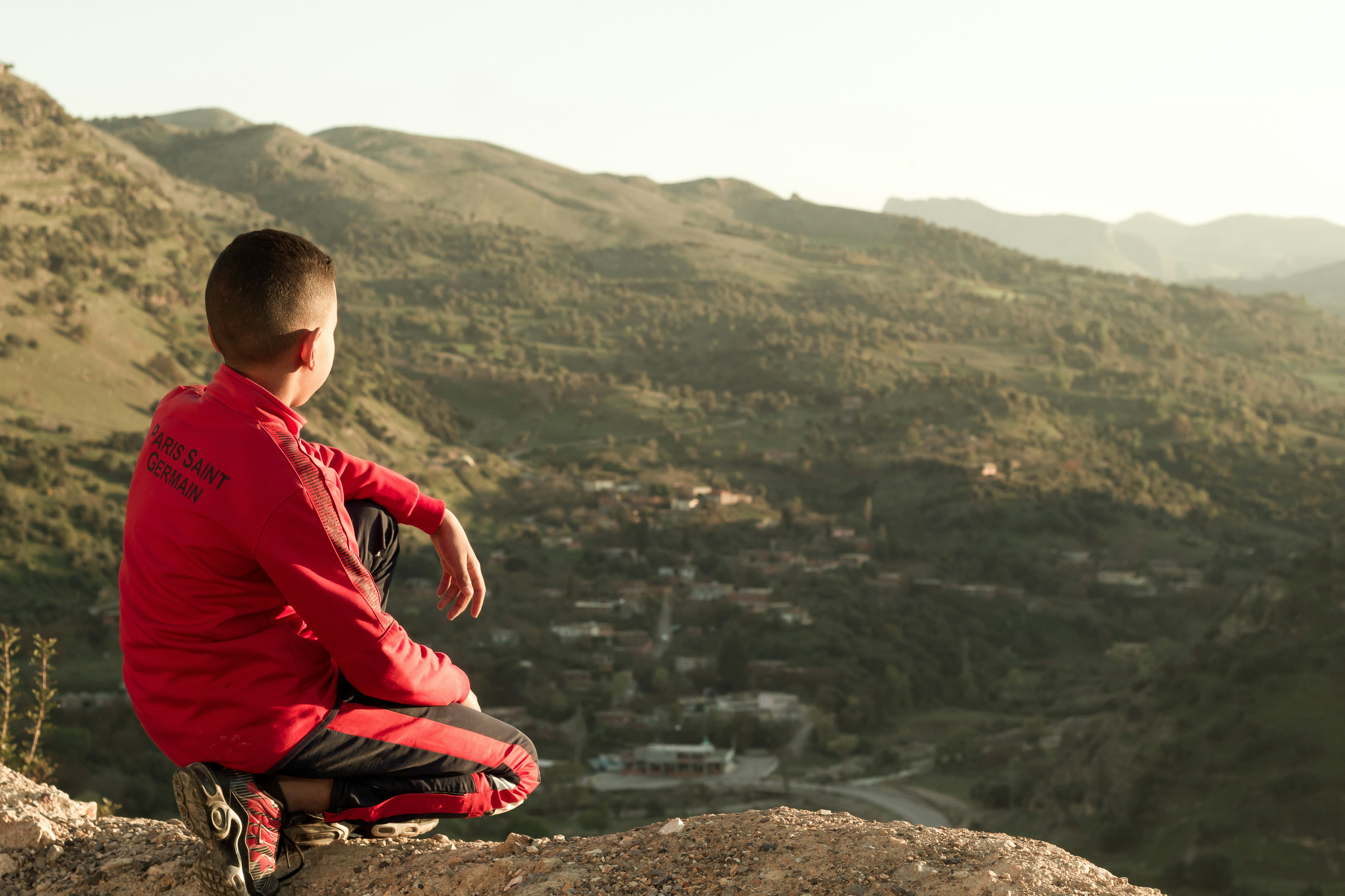 A boy looking to an amazing view 