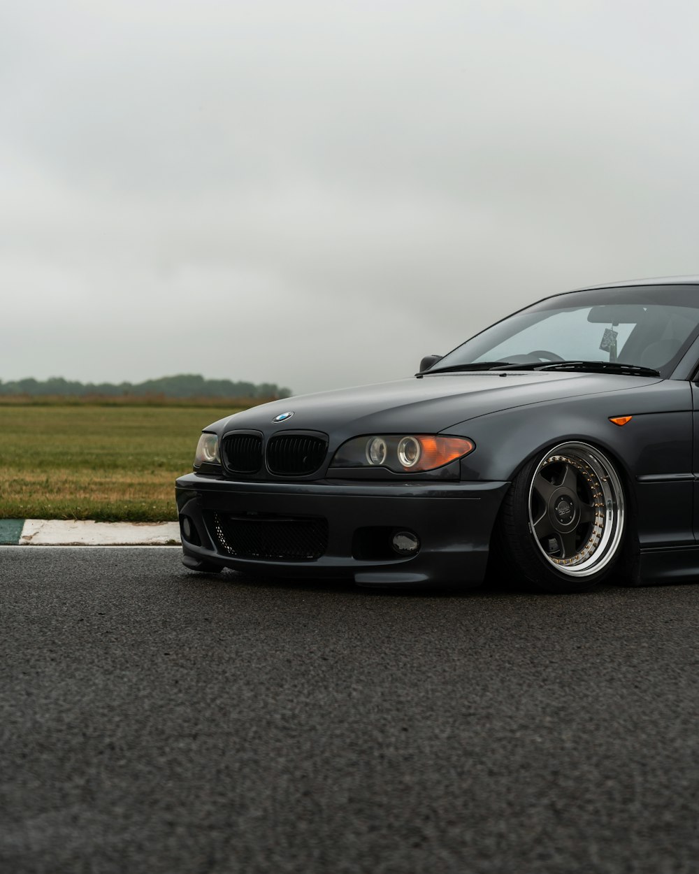 black bmw m 3 on road during daytime