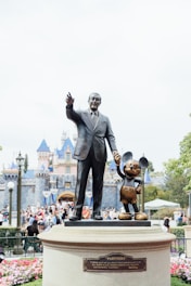 man in black suit statue