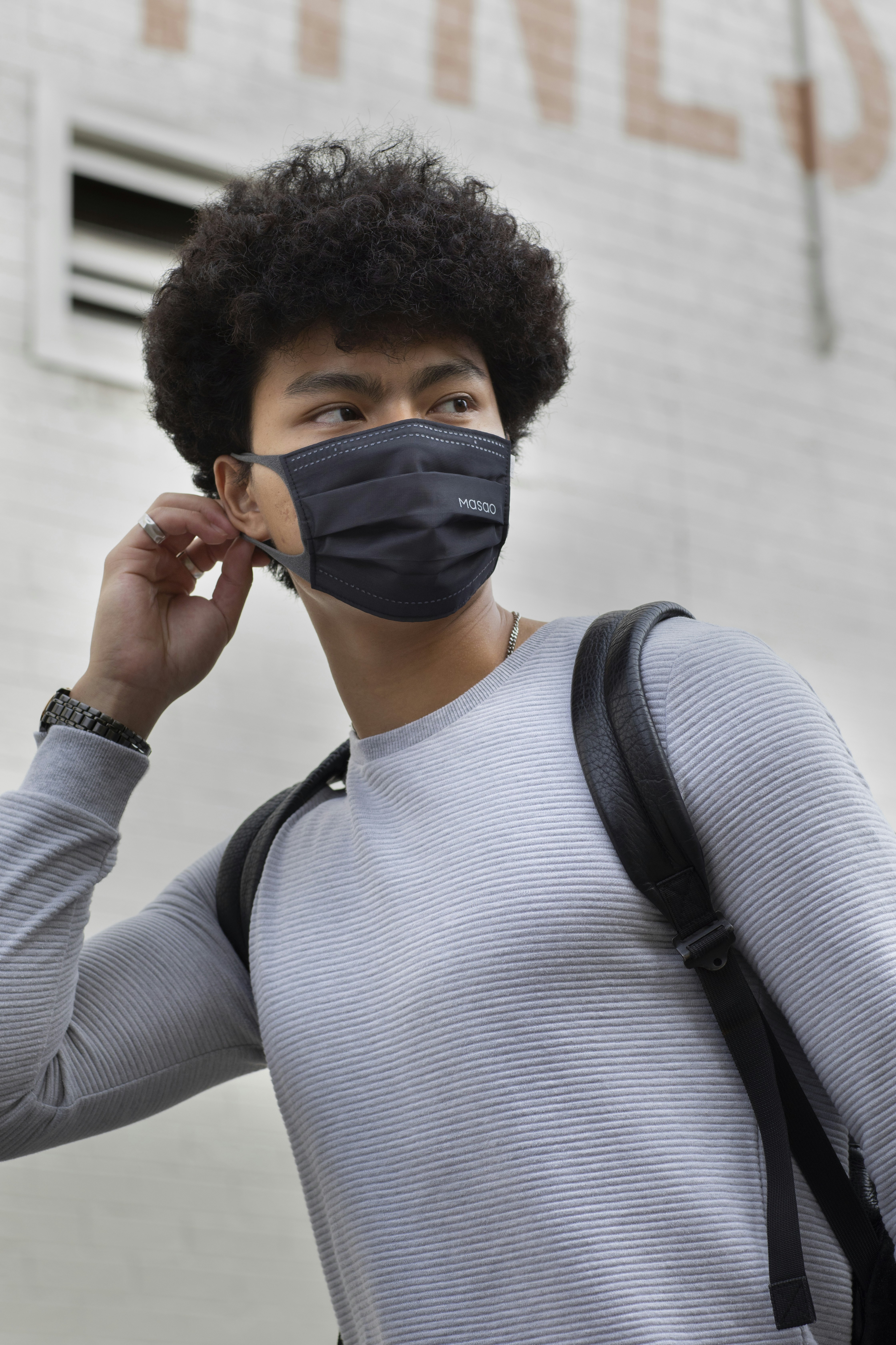 man in blue long sleeve shirt wearing black goggles