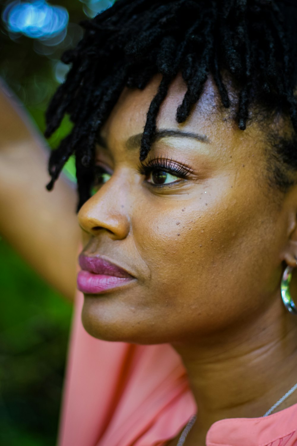 woman with black hair and green eyes