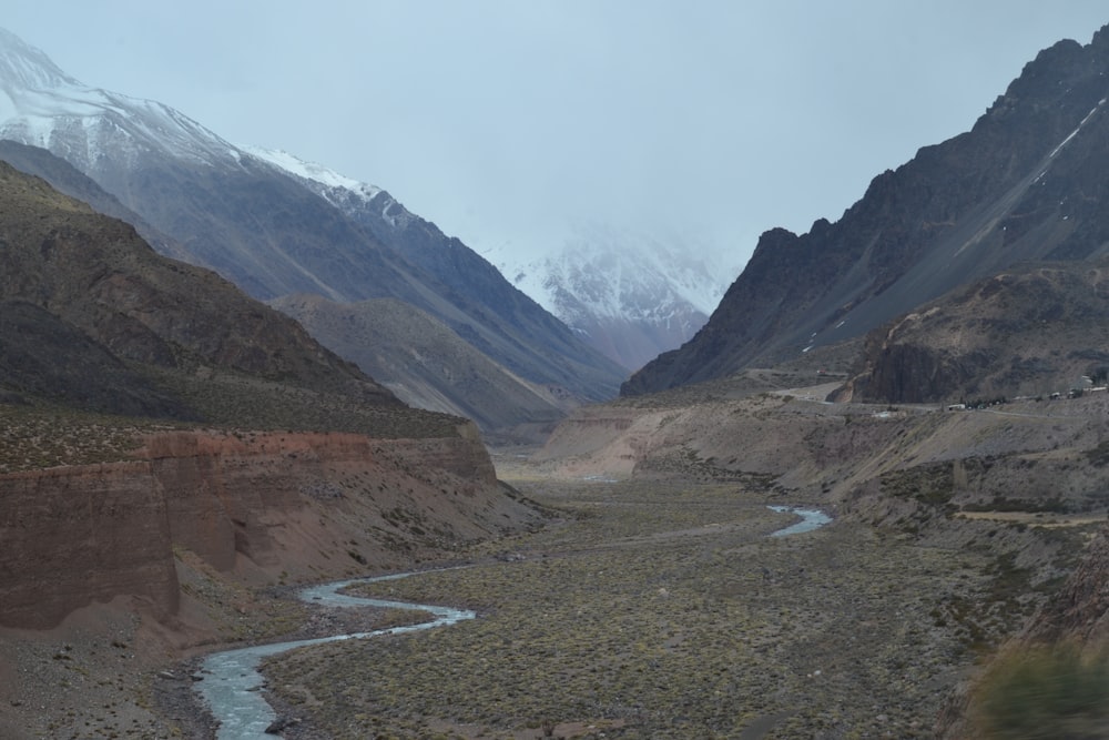 brown and gray mountains under white sky during daytime