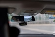 car side mirror with water droplets