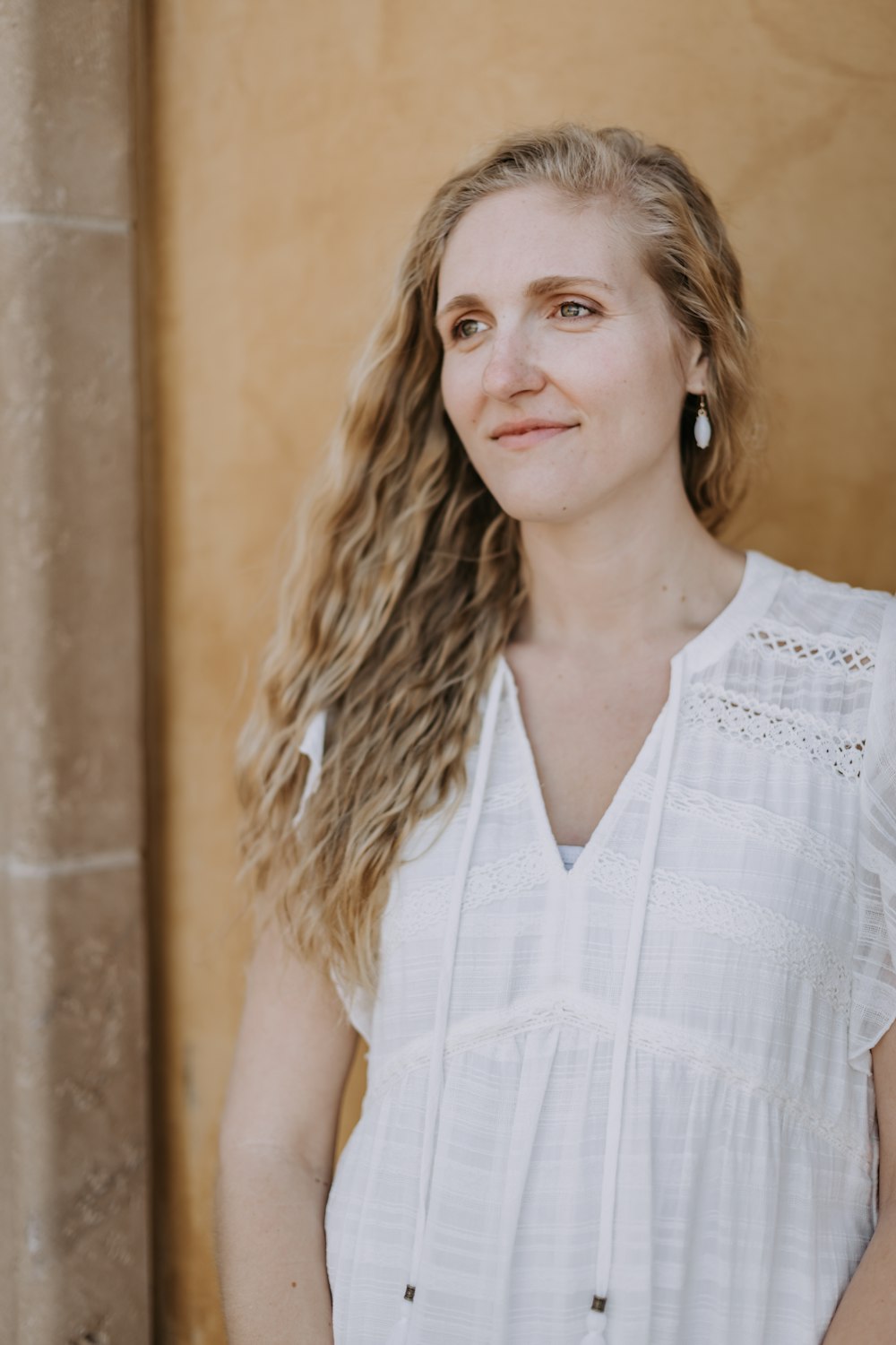 woman in white sleeveless top