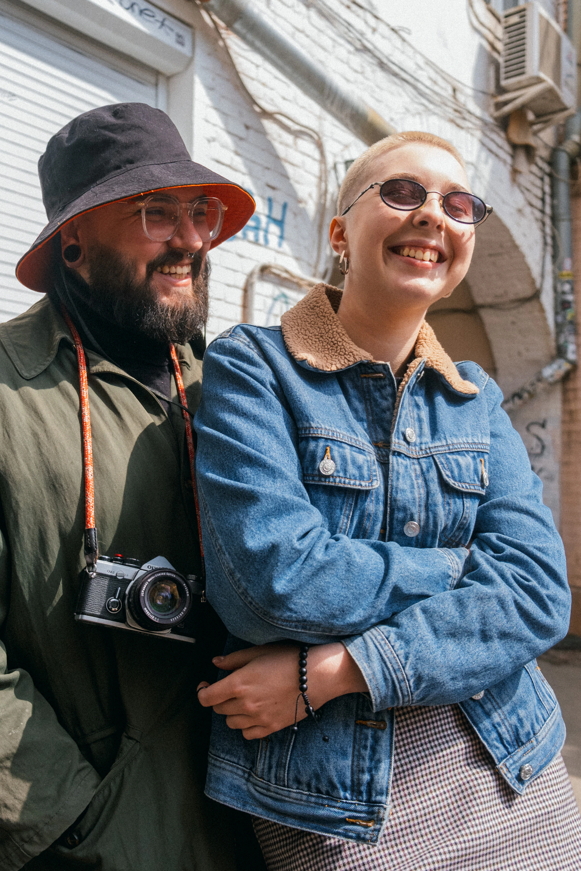 woman wearing yellow long-sleeved dress under white clouds and blue sky during daytime