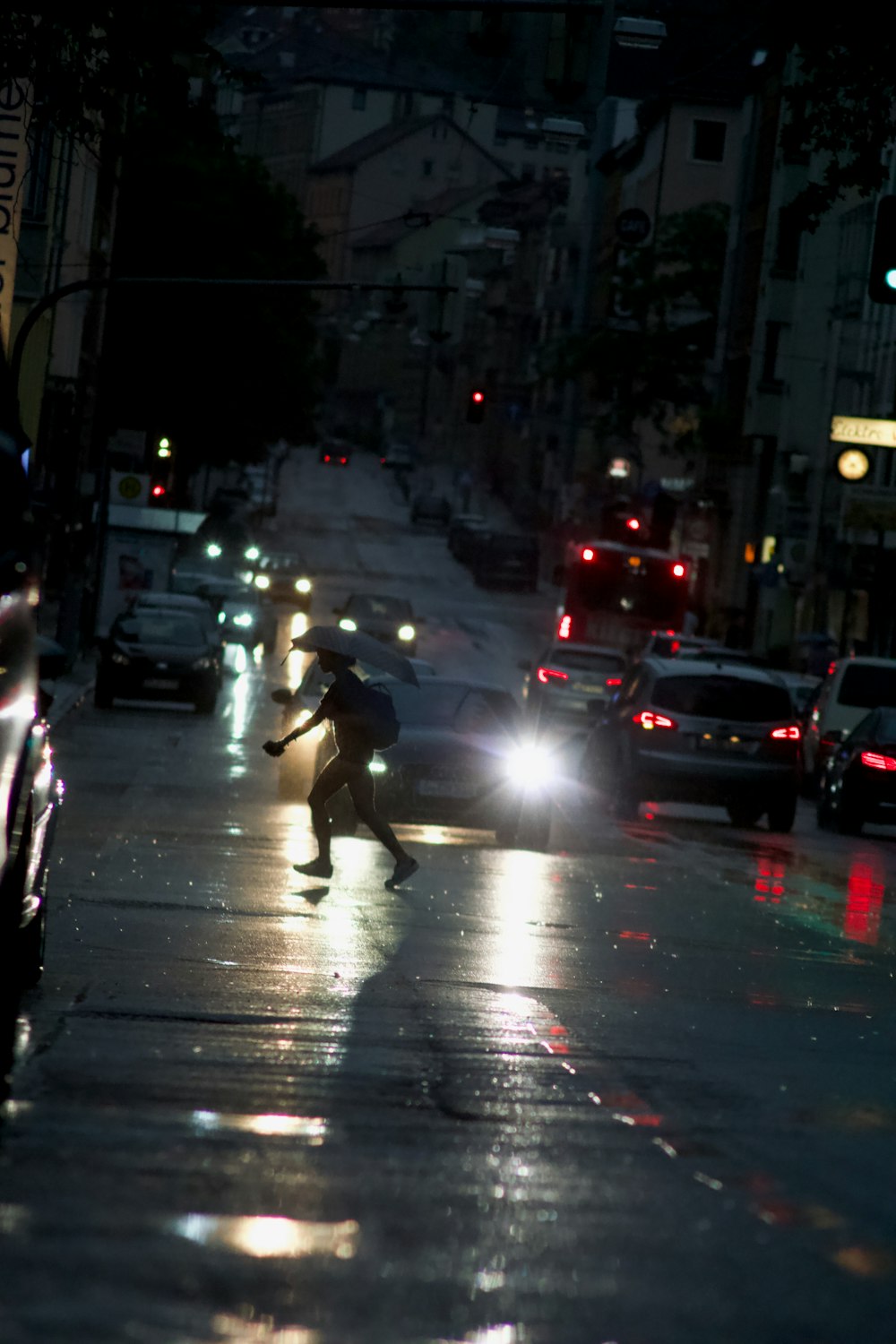 people crossing on pedestrian lane during daytime