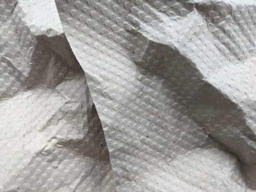 Cartons, corrugated boxes, and wrapping materials