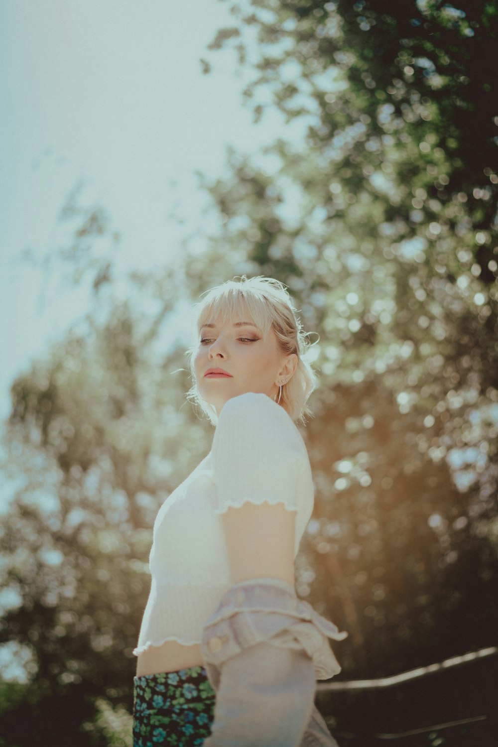 woman in white long sleeve shirt