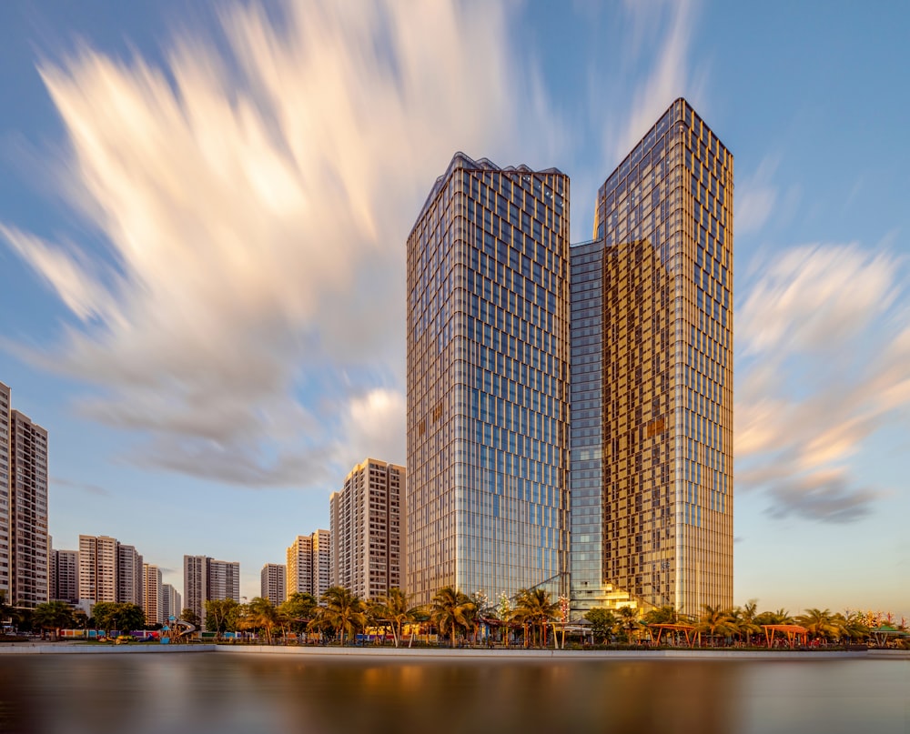 city skyline across body of water during daytime