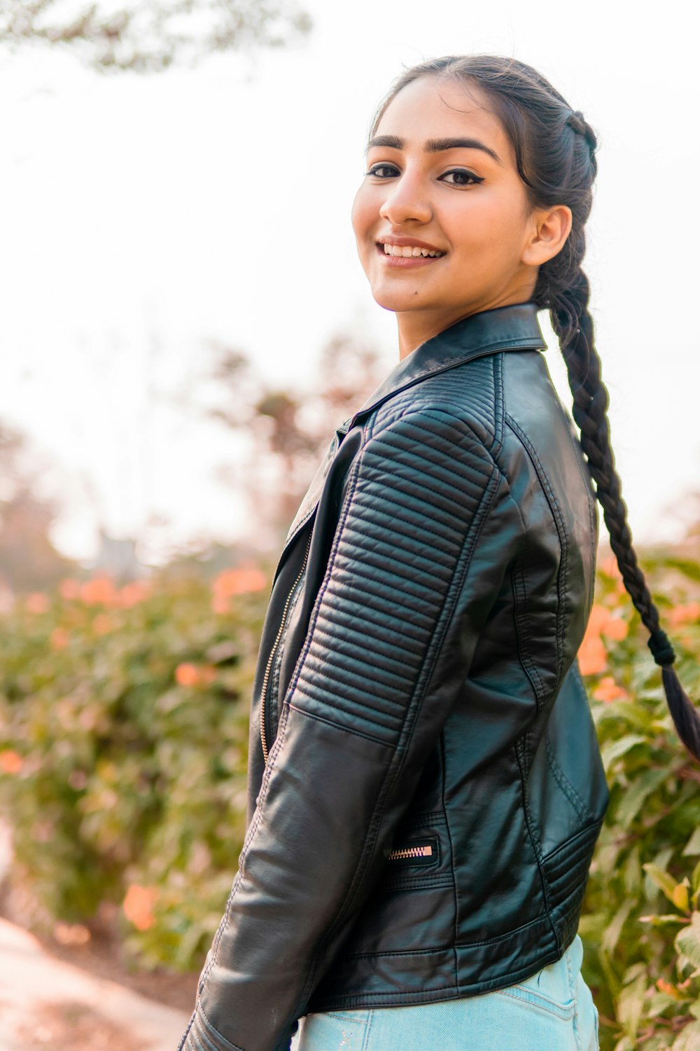 man in black leather jacket