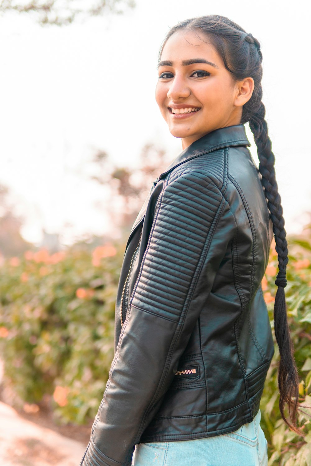 woman in black leather jacket