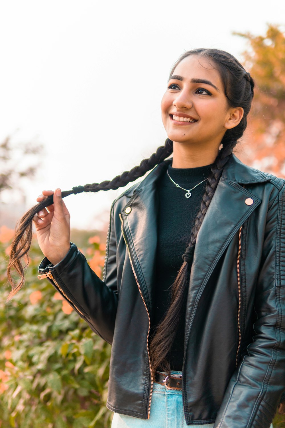 woman in black leather jacket