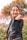 woman in black leather jacket smiling
