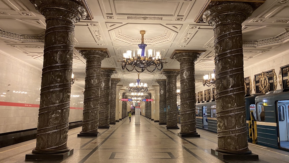 white and brown hallway with glass windows