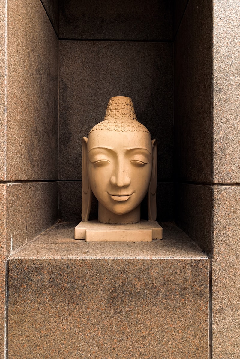 Brown ceramic Buddha figure