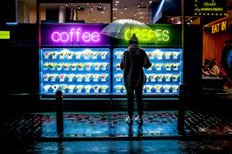 Bright, waterproof takeaway menus displayed on a café table.