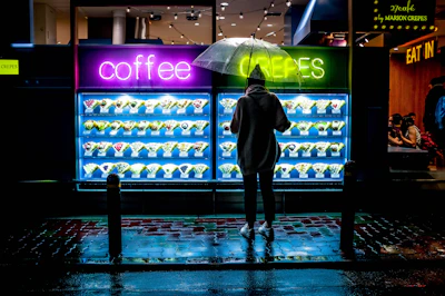 Bright, waterproof takeaway menus displayed on a café table.
