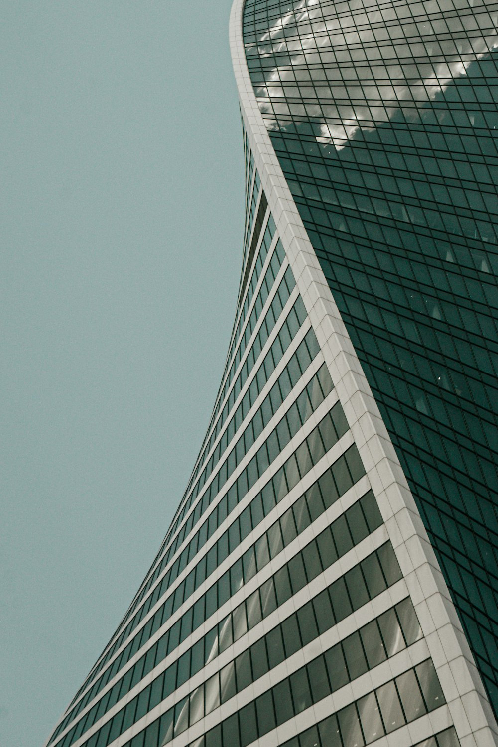 white concrete building under blue sky during daytime