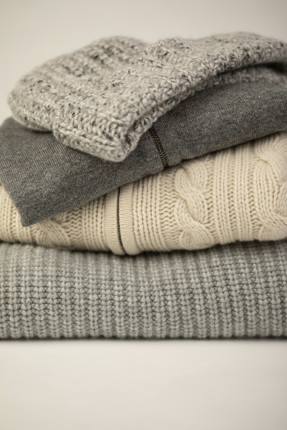 gray and white bath towels