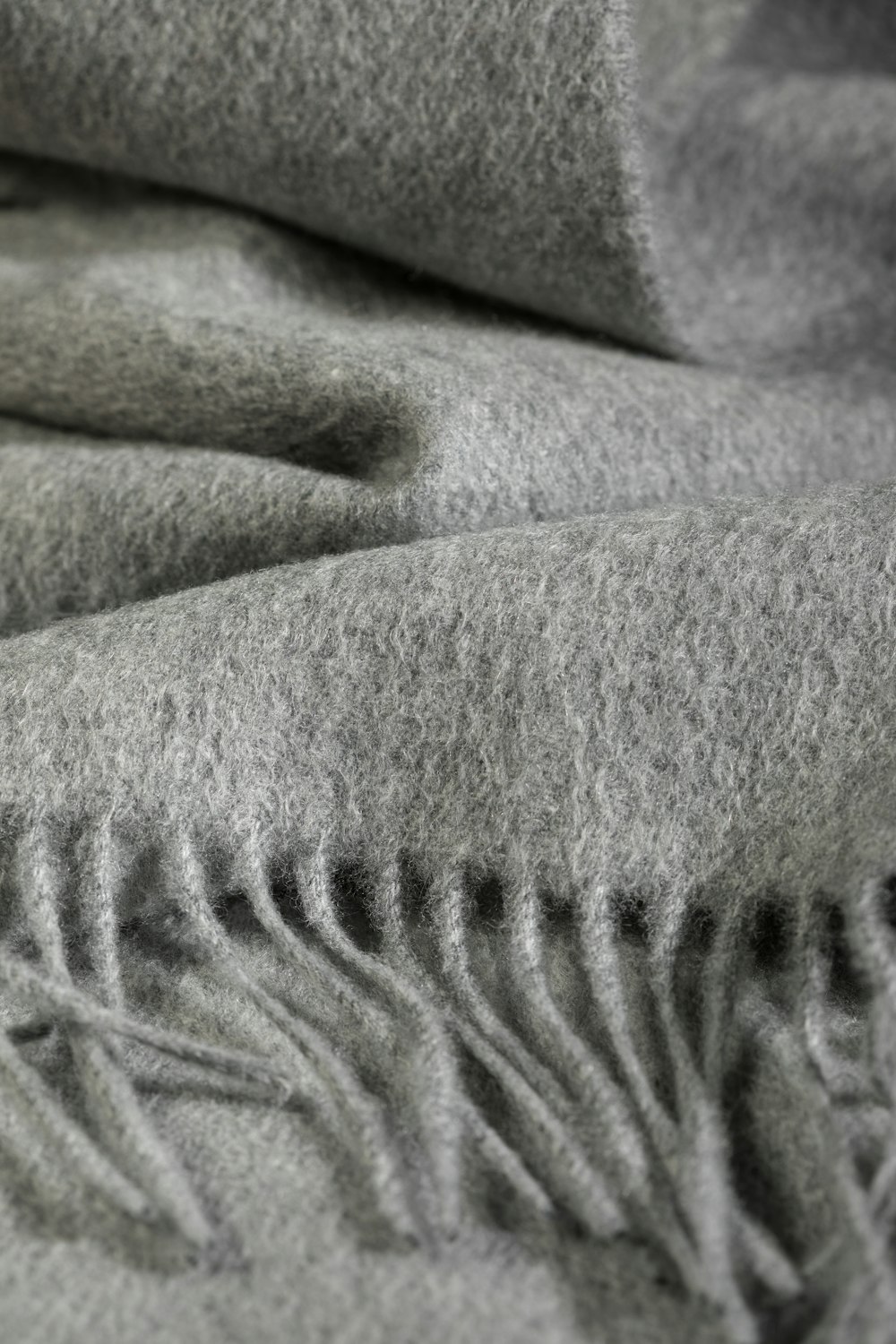 gray and white fleece textile