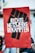 A protest sign featuring a stylized black fist on a red background with bold white lettering that reads 'RECHTE NETZWERKE BEKÄMPFEN'. The image captures a scene from a demonstration with people in the background.