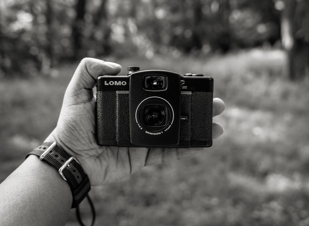 black and silver dslr camera