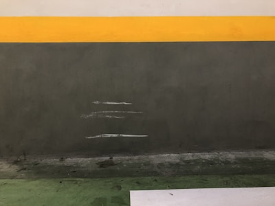 Before and after images showing a repaired and polished damaged floor section.