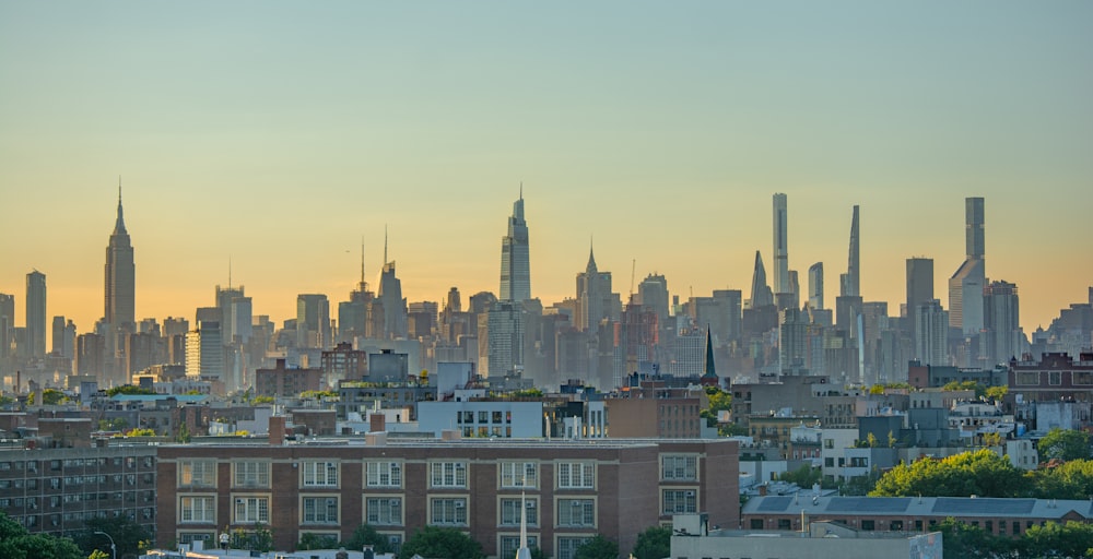 city skyline under white sky during daytime